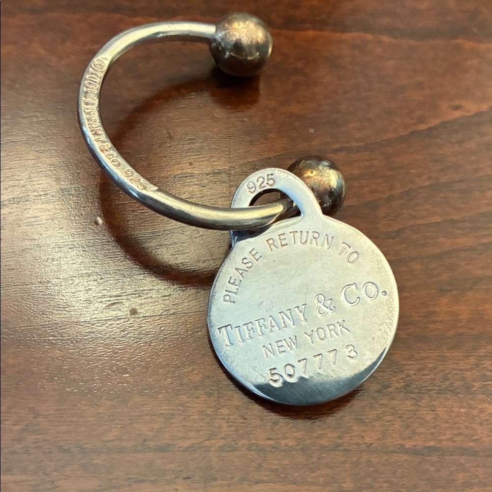 Tiffany & Co. Silver screwball key ring with Engraved return to Tiffany Charm